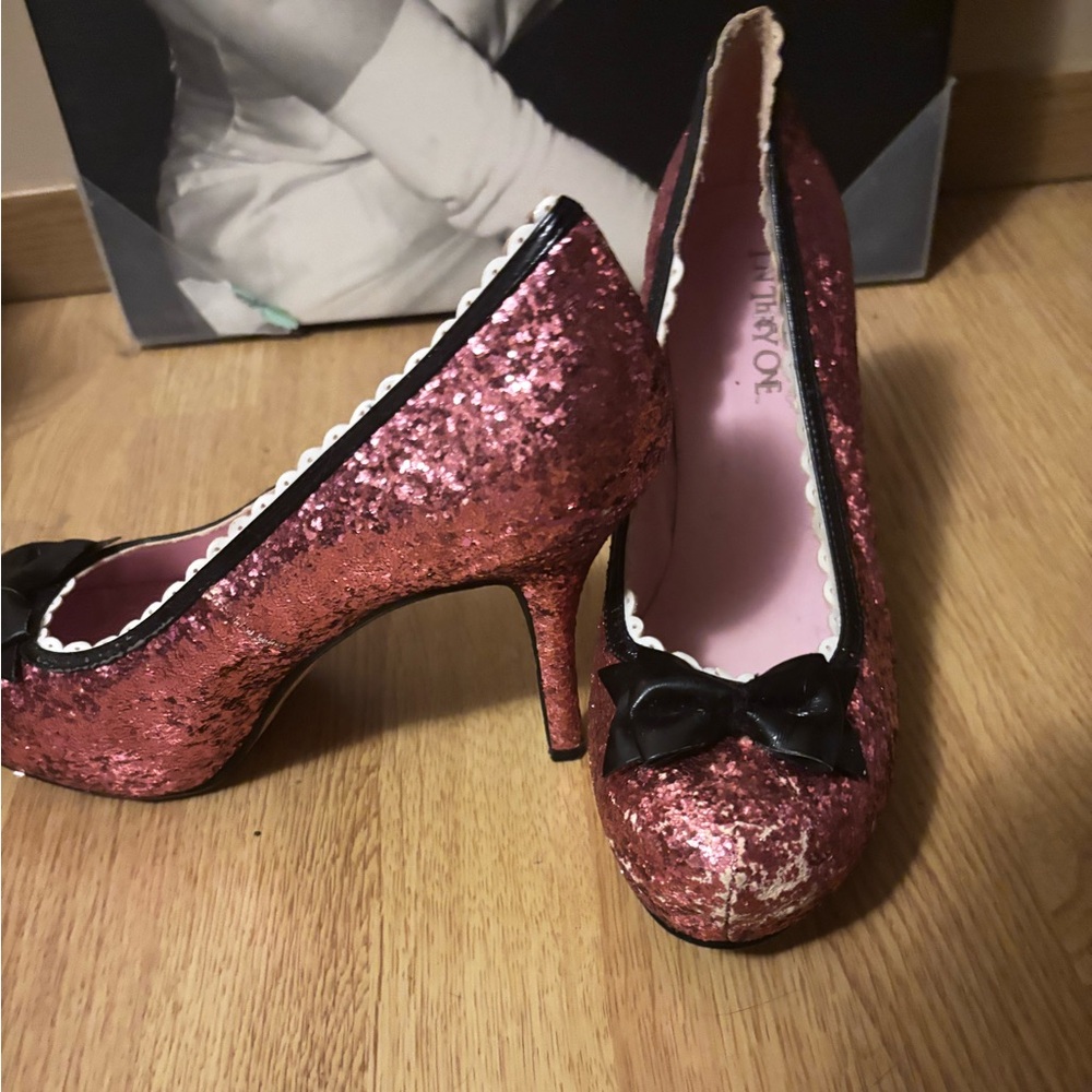 thirty-one Pink and Black Heels with Decorative Bow
